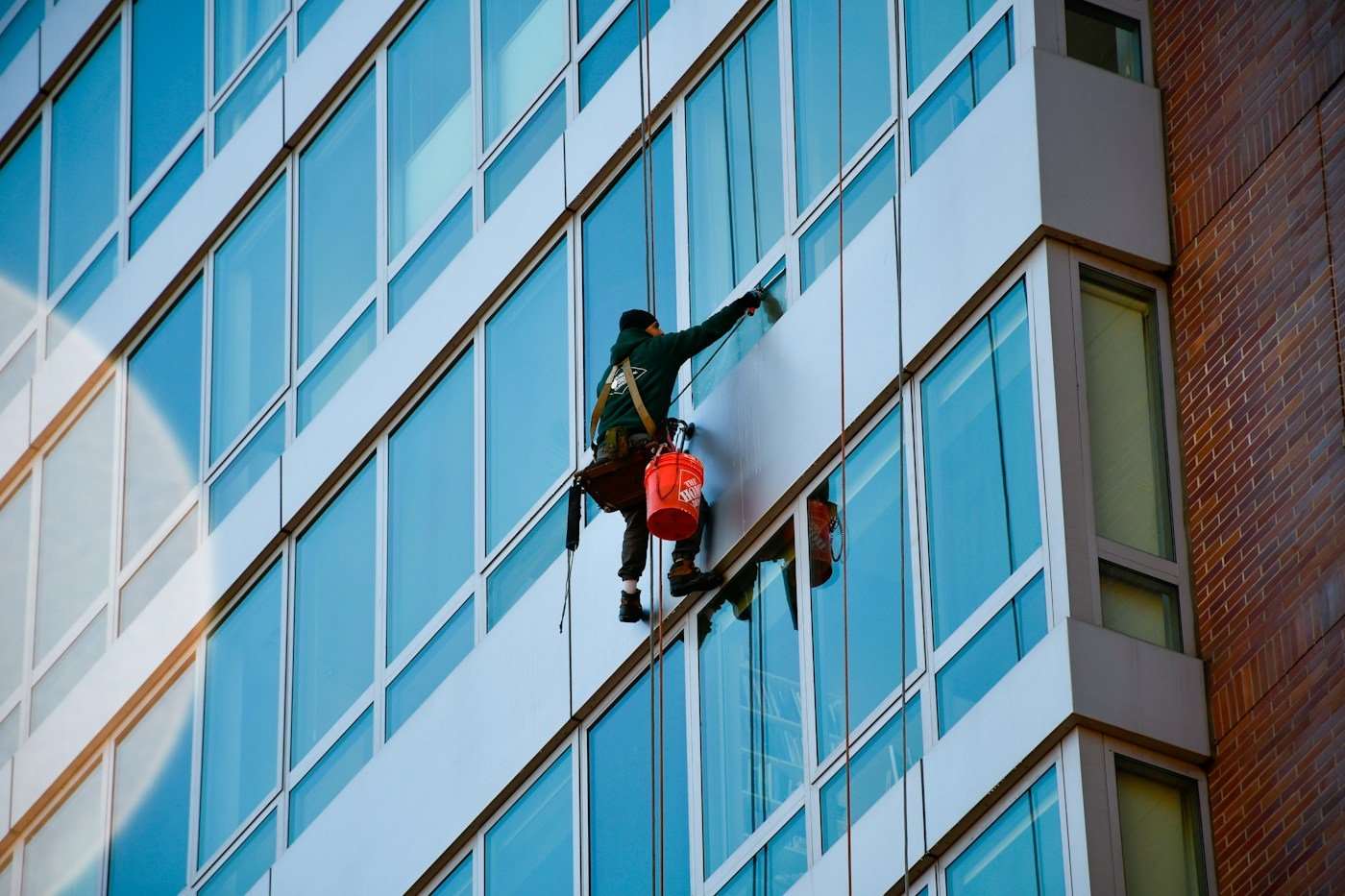 High-rise window cleaning on a modern building